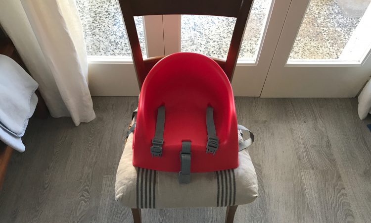 A child booster seat for meal times.